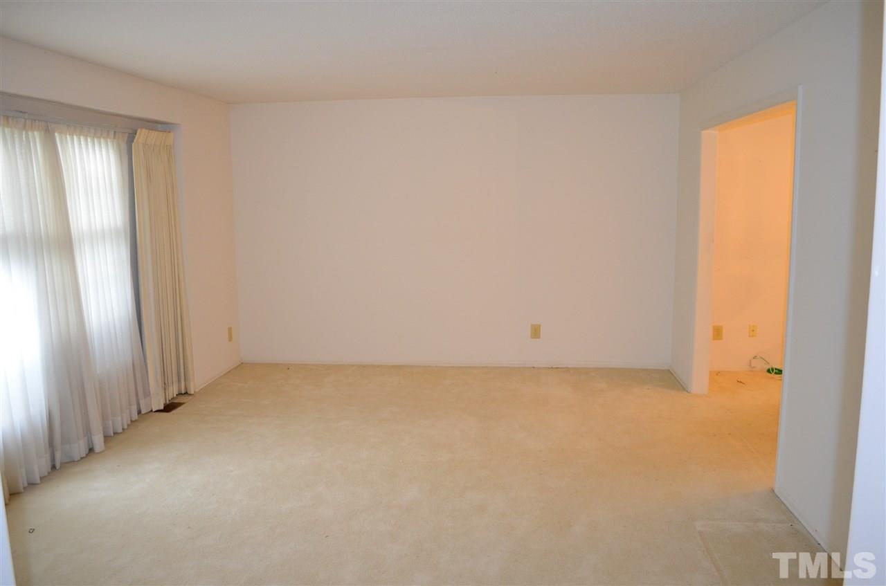 3001 Morningside Drive Raleigh, NC 27607 - Photo 12 of 16 an empty room with windows