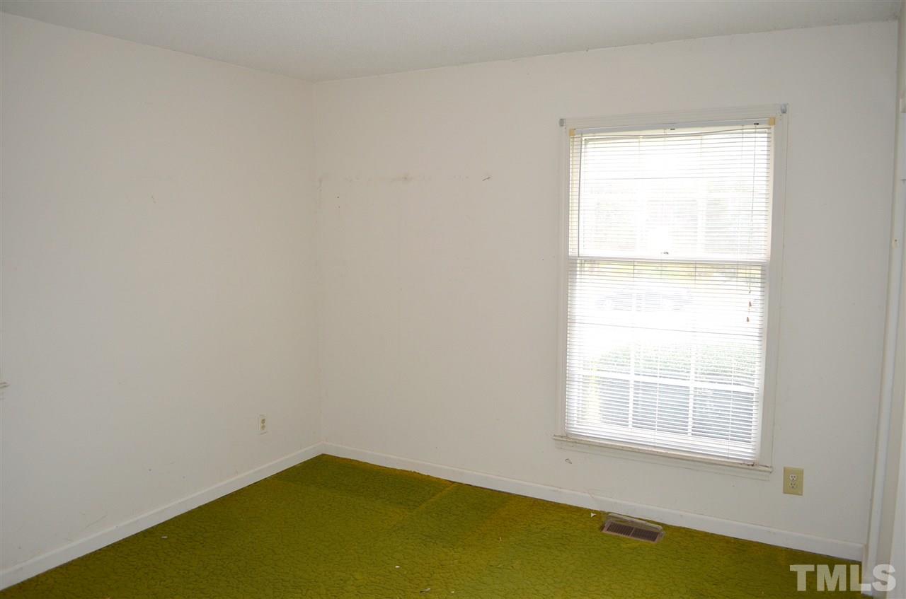 3001 Morningside Drive Raleigh, NC 27607 - Photo 14 of 16 an empty room with a window