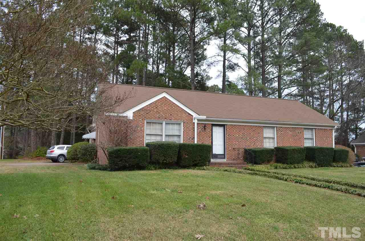 3001 Morningside Drive Raleigh, NC 27607 - Photo 3 of 16 a front view of house with yard and trees in the background