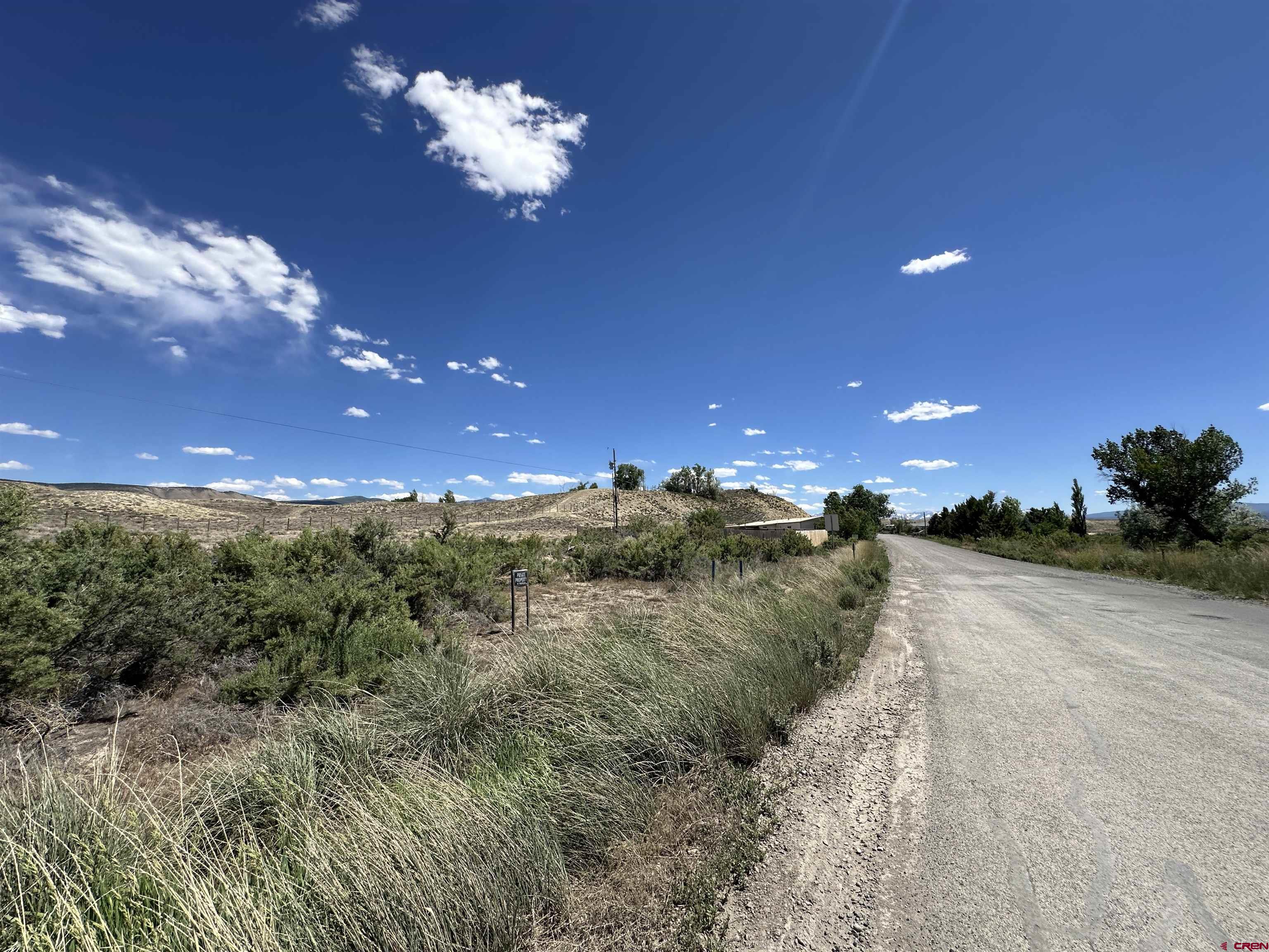 Tbd (lot 2 6900th Road Montrose, CO 81401 - Photo 11 of 11 a view of a yard and mountain view