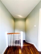 2805 Austin Street, Unit B Corpus Christi, TX 78404 - Photo 3 of 13 an empty room with wooden floor and windows
