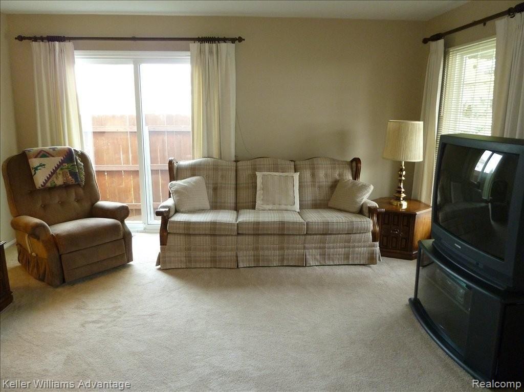 42460 Saratoga Road, Unit 9 Canton, MI 48187 - Photo 10 of 22 LR W/Doorwall To Patio