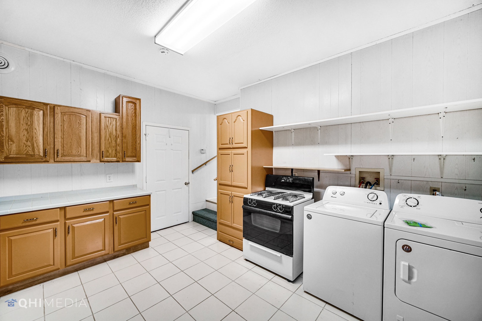2263 Fox Run Drive Kankakee, IL 60901 - Photo 17 of 34 a view of a kitchen with storage and utility