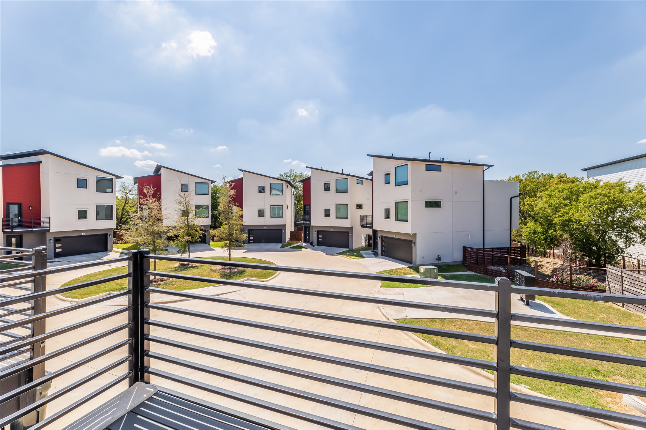 1417 Kramer Lane, Unit 9 Austin, TX 78758 - Photo 24 of 40 Balcony featuring a residential view