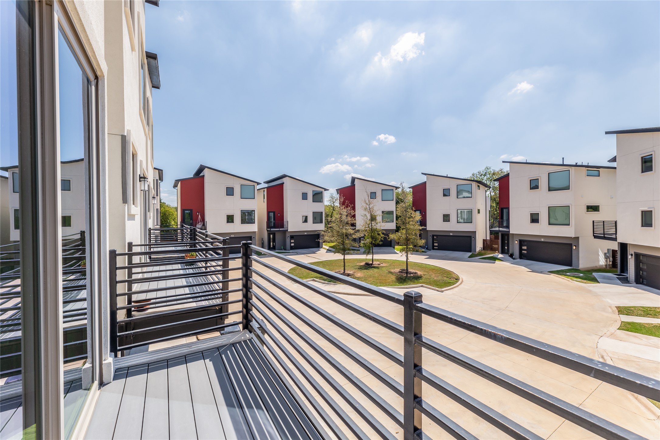 1417 Kramer Lane, Unit 9 Austin, TX 78758 - Photo 26 of 40 Balcony with a residential view