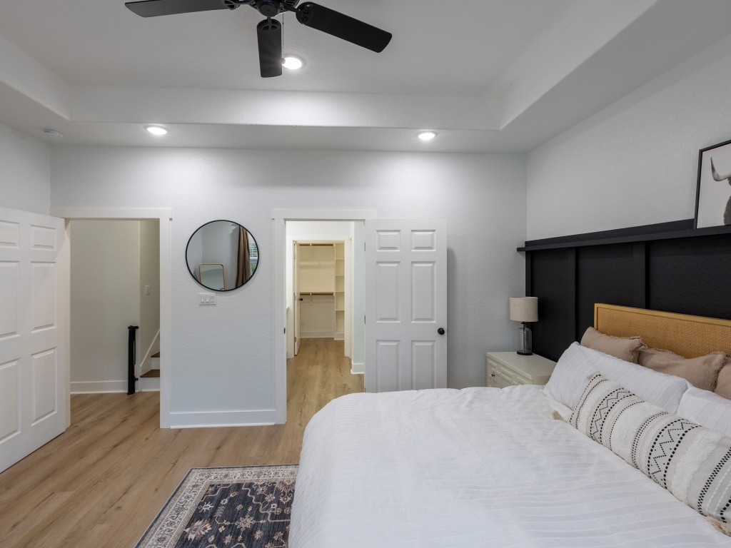111 V Allen Lane Coldspring, TX 77331 - Photo 14 of 35 a bedroom with a bed and a dresser