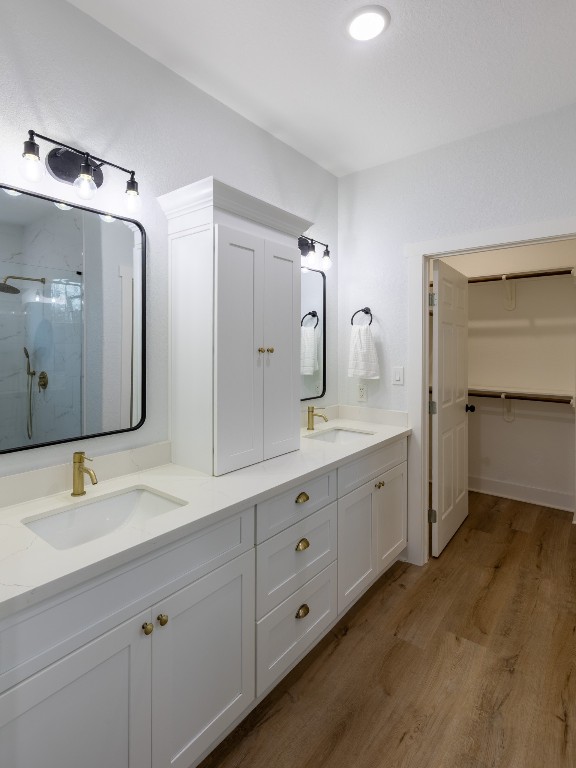111 V Allen Lane Coldspring, TX 77331 - Photo 17 of 35 a spacious bathroom with double sink and mirror