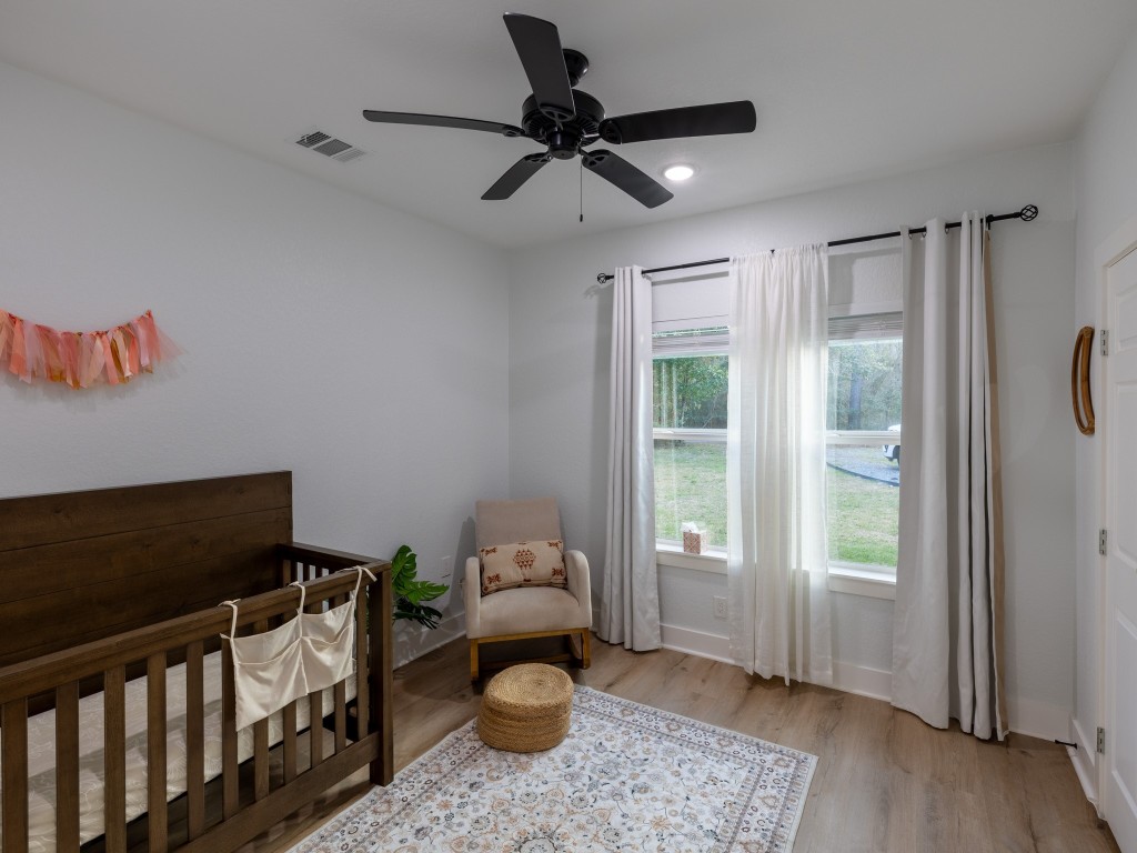 111 V Allen Lane Coldspring, TX 77331 - Photo 21 of 35 a living room with furniture and a window