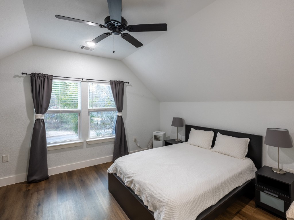 111 V Allen Lane Coldspring, TX 77331 - Photo 25 of 35 a bedroom with a bed and a window