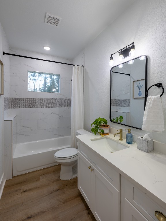 111 V Allen Lane Coldspring, TX 77331 - Photo 27 of 35 a bathroom with a sink a toilet and shower