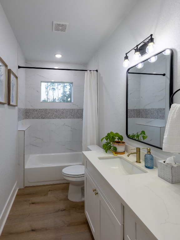 111 V Allen Lane Coldspring, TX 77331 - Photo 28 of 35 a bathroom with a sink a toilet and shower