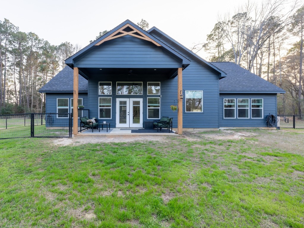 111 V Allen Lane Coldspring, TX 77331 - Photo 35 of 35 front view of a house with a yard