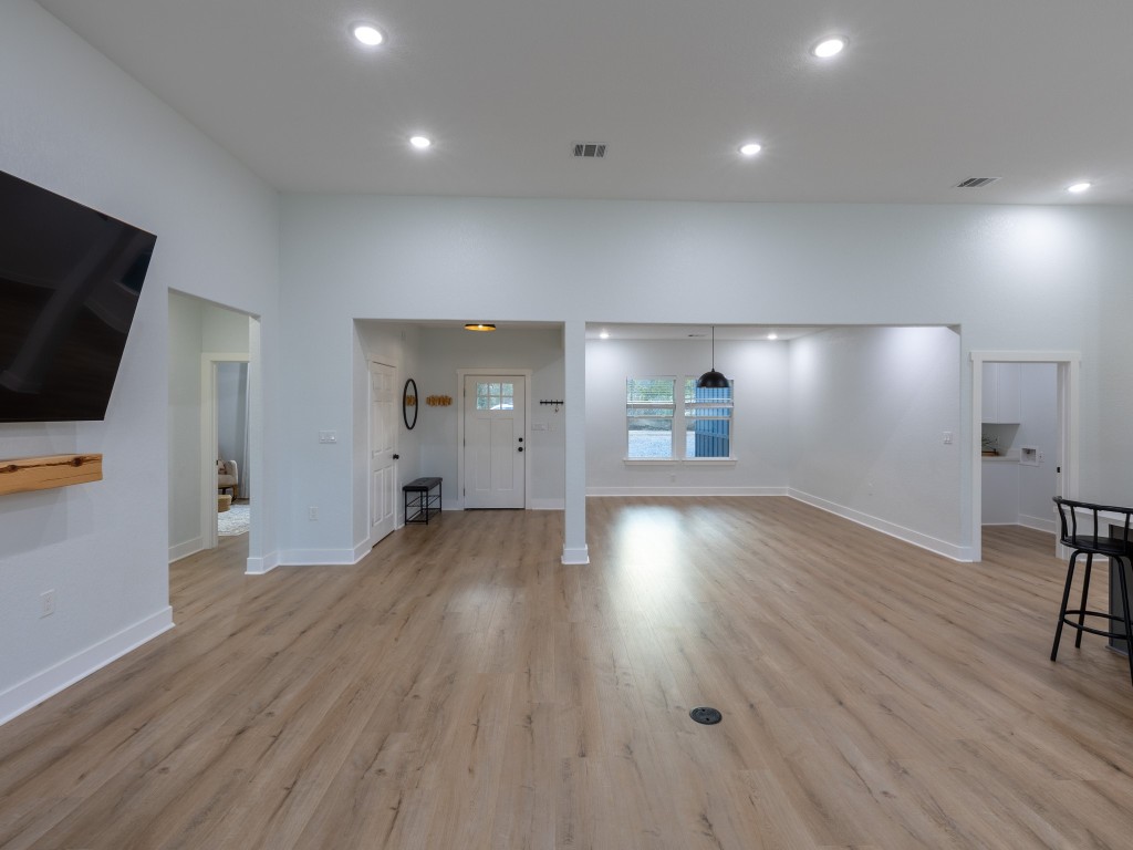 111 V Allen Lane Coldspring, TX 77331 - Photo 8 of 35 a view of empty room with wooden floor