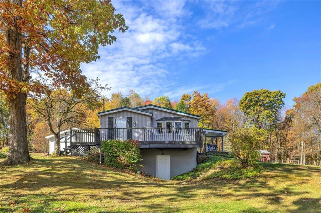 a view of a house with a swimming pool