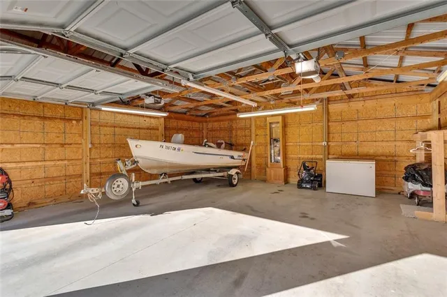a view of parking garage with cars
