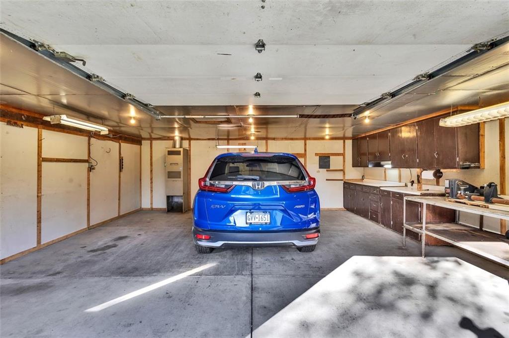 2200 Prospect Road Prospect, PA 16052 - Photo 31 of 47 a car that is parked in a garage