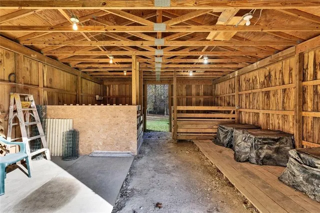 a view of a room with wooden walls