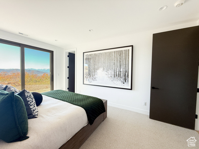 2132 East Outlaw Road, Unit 49 Kamas, UT 84036 - Photo 35 of 44 Carpeted bedroom featuring access to exterior, a mountain view, and recessed lighting