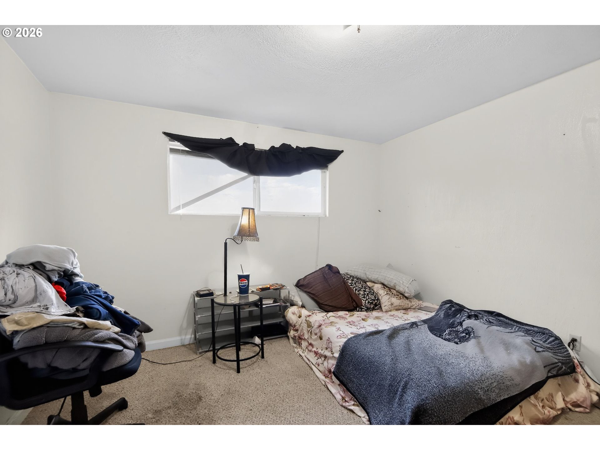 376 Northeast Chestnut Street Madras, OR 97741 - Photo 22 of 26 a living room with furniture and a gym equipment