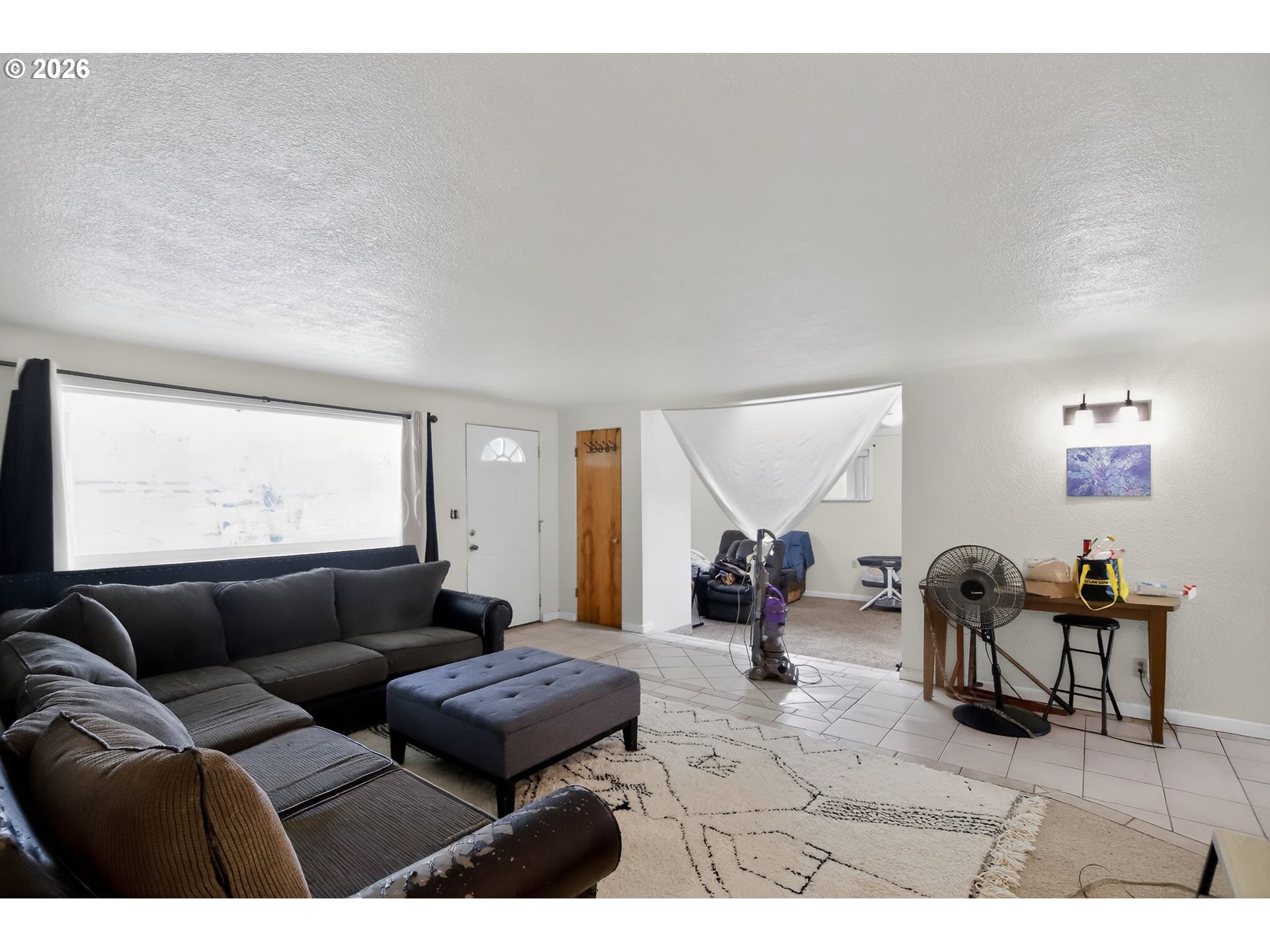 376 Northeast Chestnut Street Madras, OR 97741 - Photo 6 of 26 a living room with furniture and large window