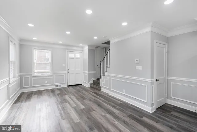 a view of a kitchen with a sink and dishwasher