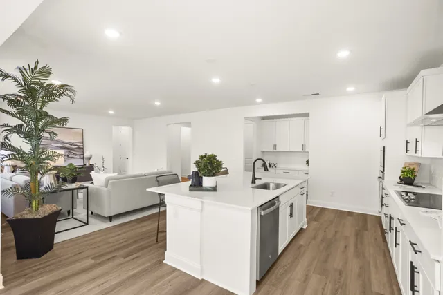 a bedroom with a bed and a cabinets