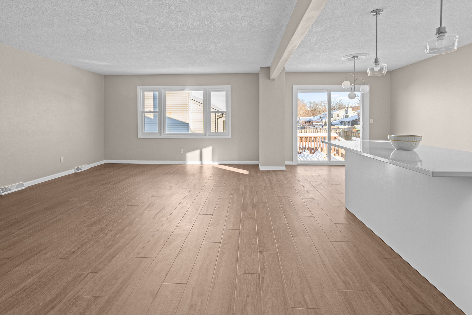 5302 16th Avenue Moline, IL 61265 - Photo 19 of 34 a view of a livingroom with wooden floor and a window