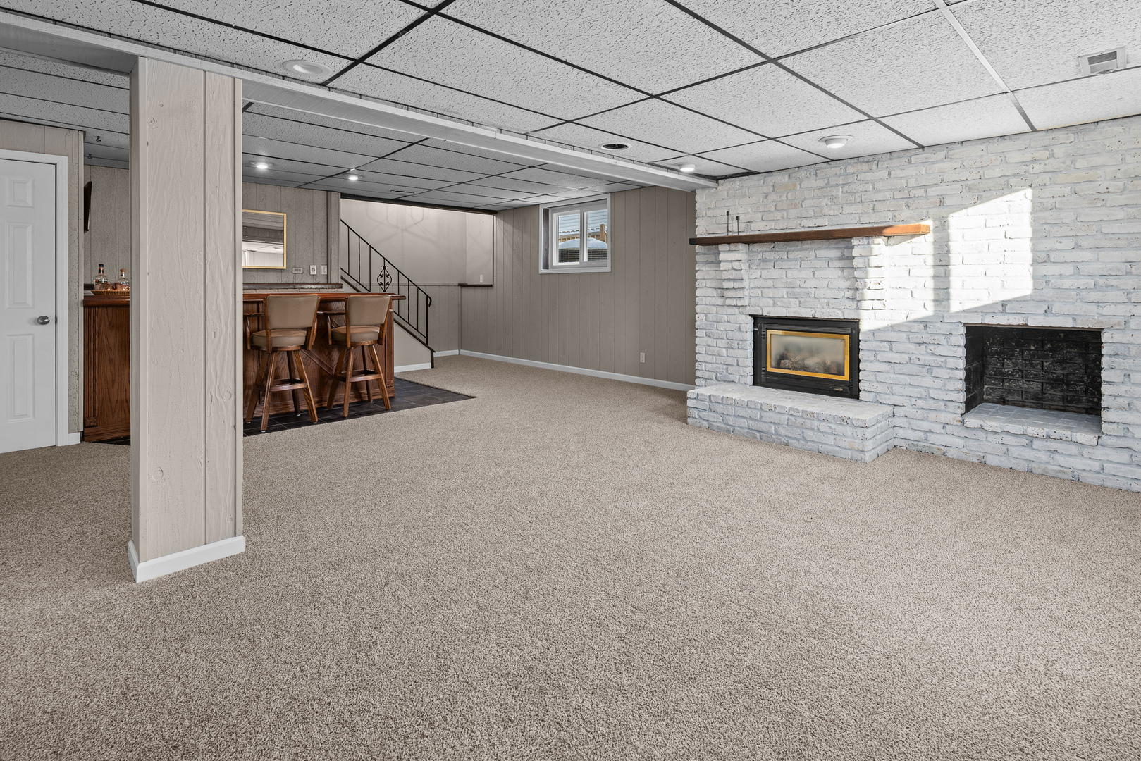 5302 16th Avenue Moline, IL 61265 - Photo 25 of 34 a view of a livingroom with furniture and a fireplace