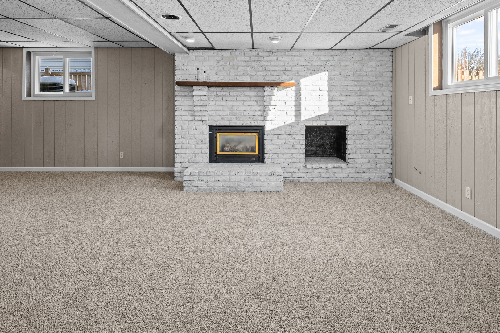 5302 16th Avenue Moline, IL 61265 - Photo 26 of 34 a view of an empty room with a fireplace and a window
