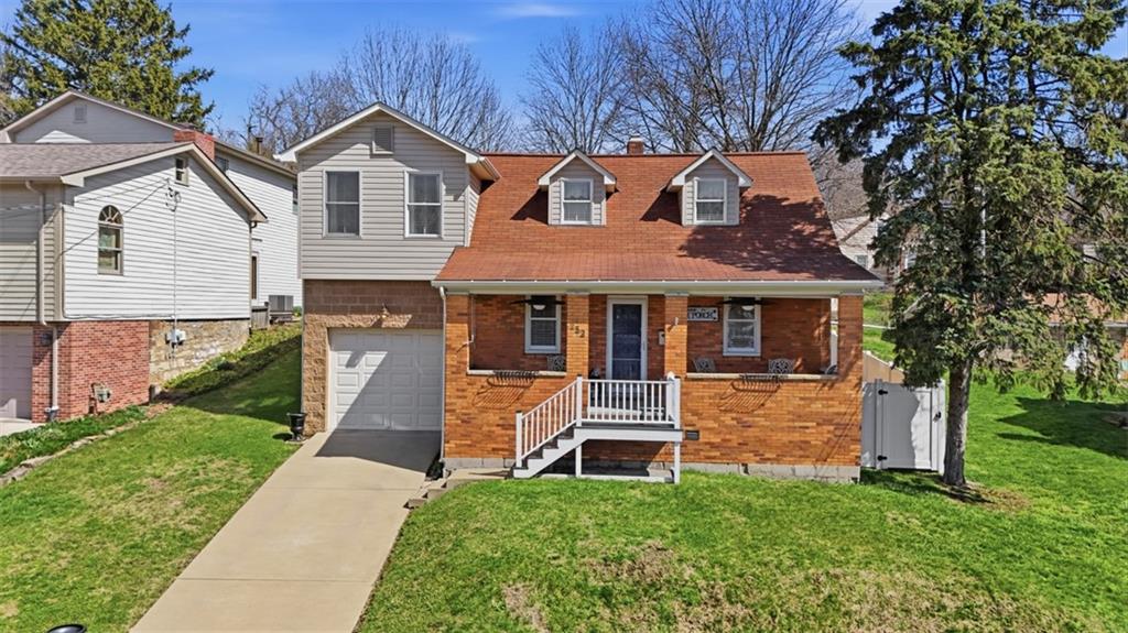 252 Berry Street Baden, PA 15005 - Photo 1 of 48 a front view of a house with a yard