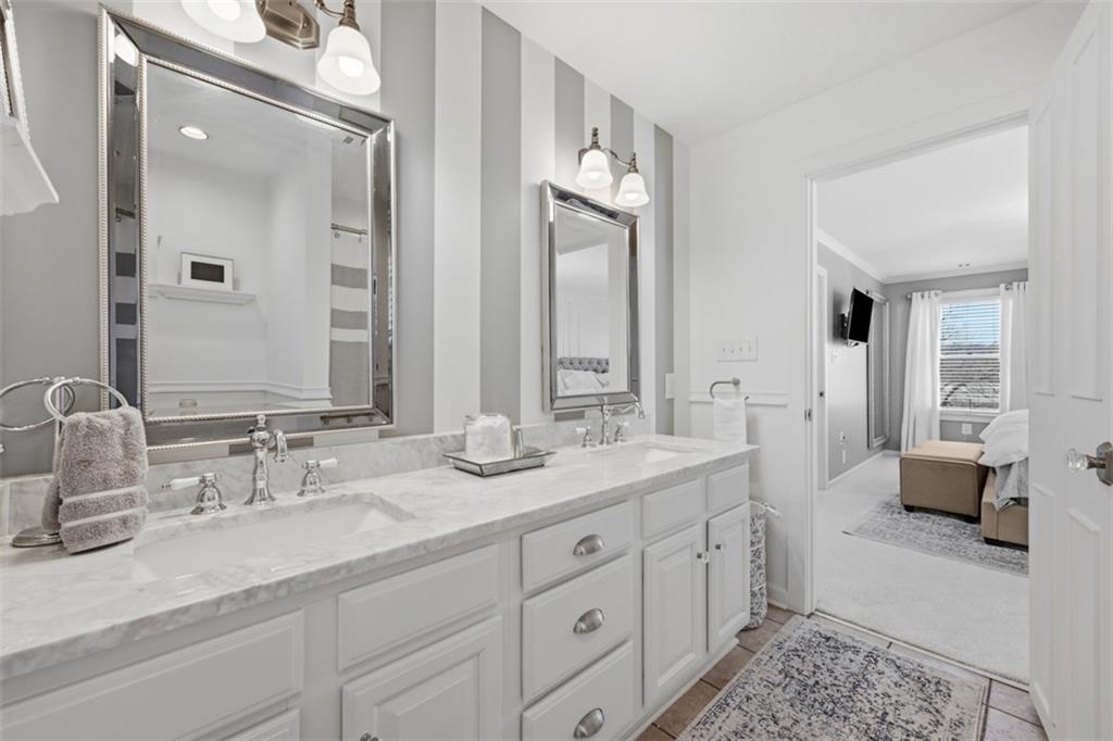 252 Berry Street Baden, PA 15005 - Photo 28 of 48 a bathroom with double sink and a mirror