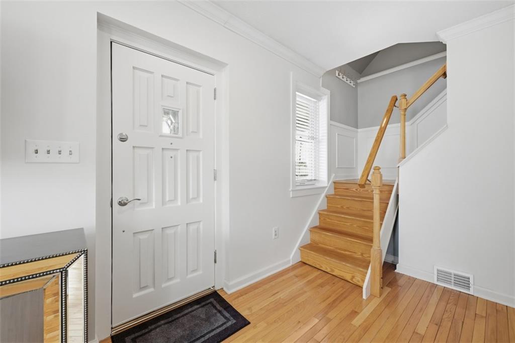 252 Berry Street Baden, PA 15005 - Photo 4 of 48 a view of an entryway with staircase