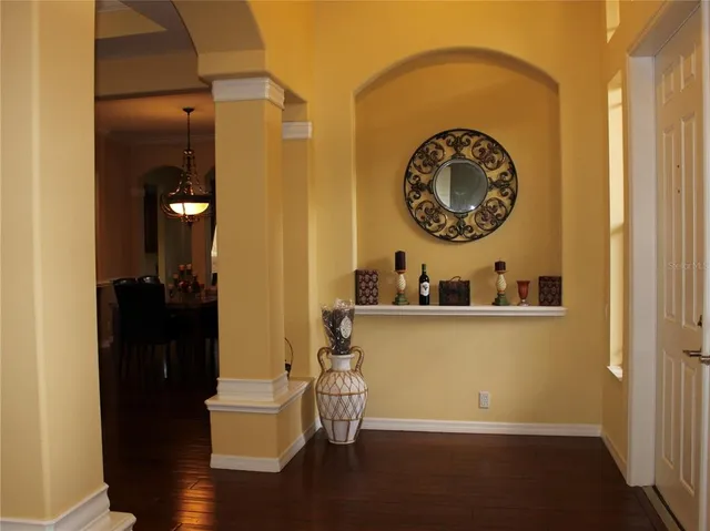 a kitchen with a table and chairs in it