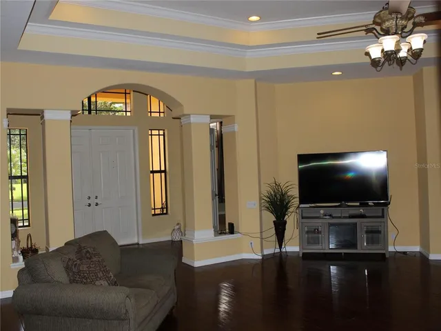 a kitchen with granite countertop cabinets and steel stove top oven