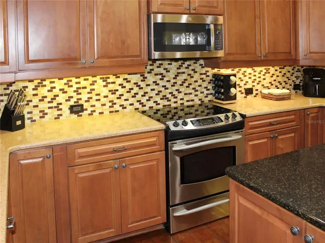 a view of a workspace with furniture