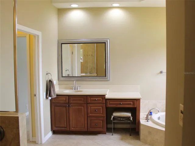 a view of a front door and wooden floor