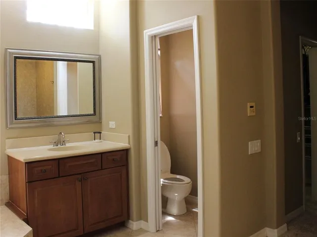 a living room with patio furniture