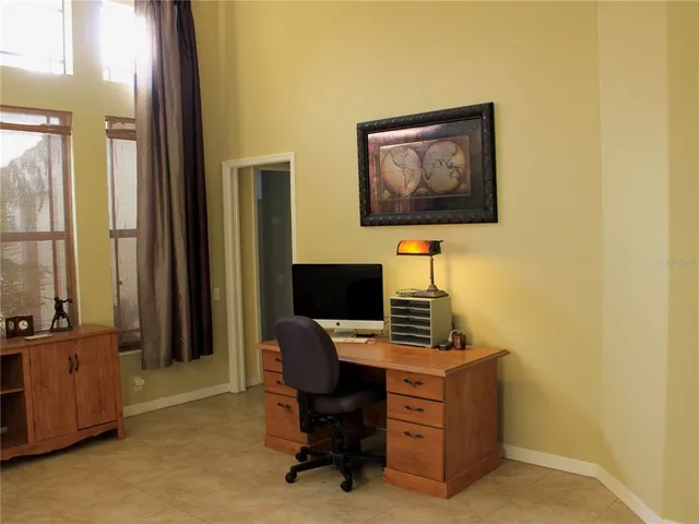 a bathroom with a sink a mirror a toilet and a shower