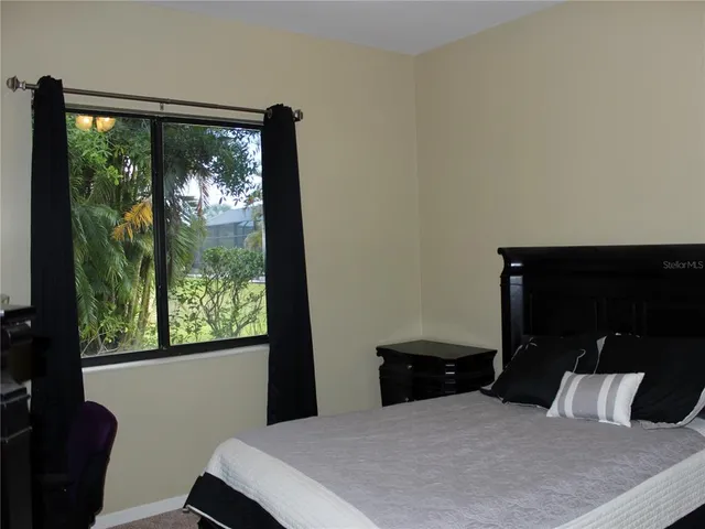 a view of an outdoor space and tennis court