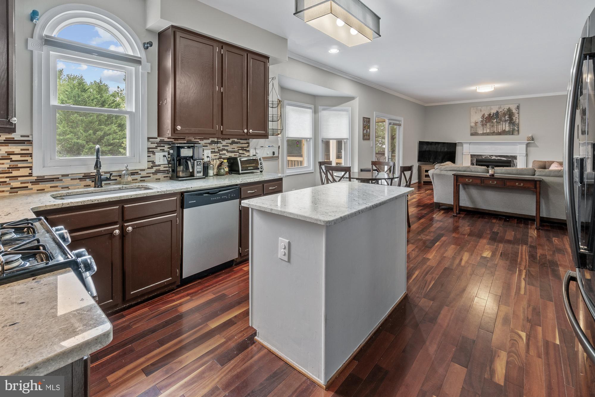 17209 General Custer Way Poolesville, MD 20837 - Photo 24 of 67 Granite counters and hardwood floors