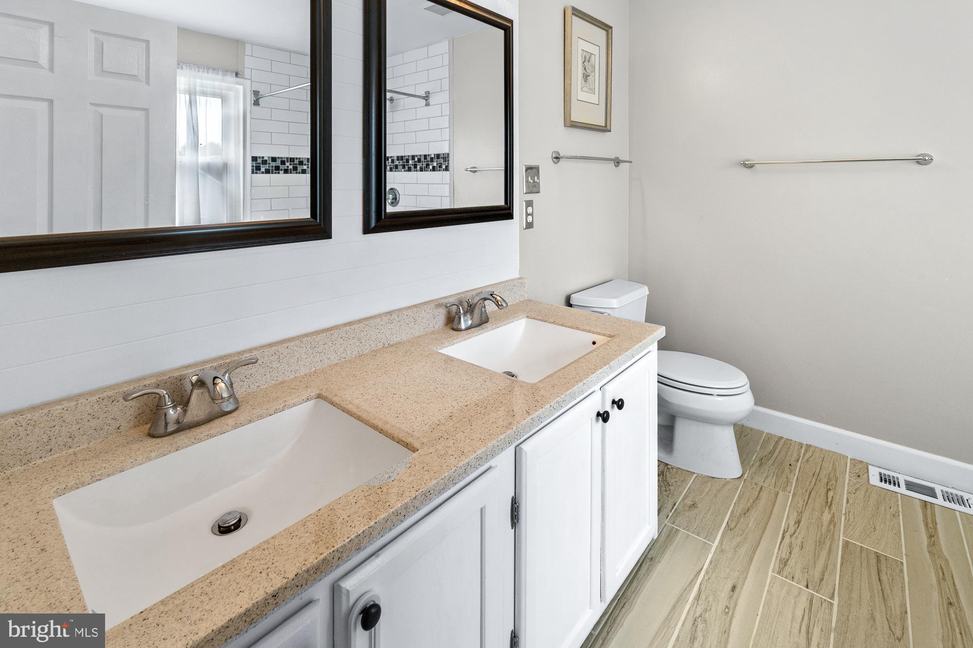 17209 General Custer Way Poolesville, MD 20837 - Photo 38 of 67 Completely renovated owner's bath with subway tile