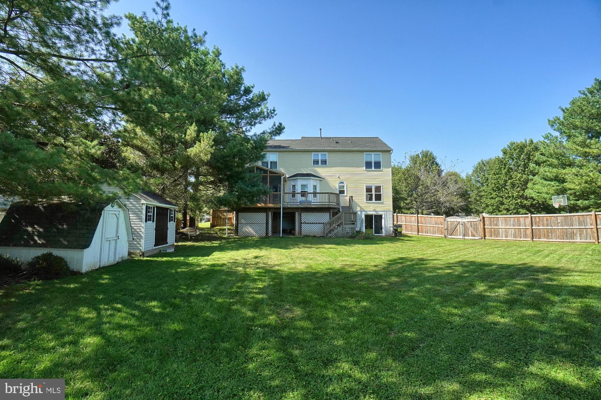 17209 General Custer Way Poolesville, MD 20837 - Photo 51 of 67 Basement walk-out finds this backyard!