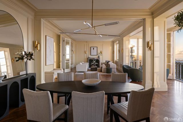 a dining room with furniture and window