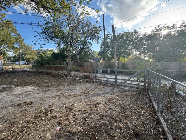 a view of a backyard with plants
