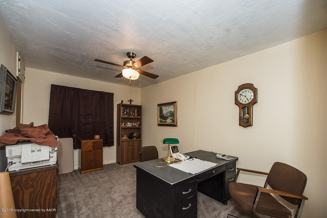 4404 South Hayden Street Amarillo, TX 79110 - Photo 22 of 29 a view of a workspace with furniture