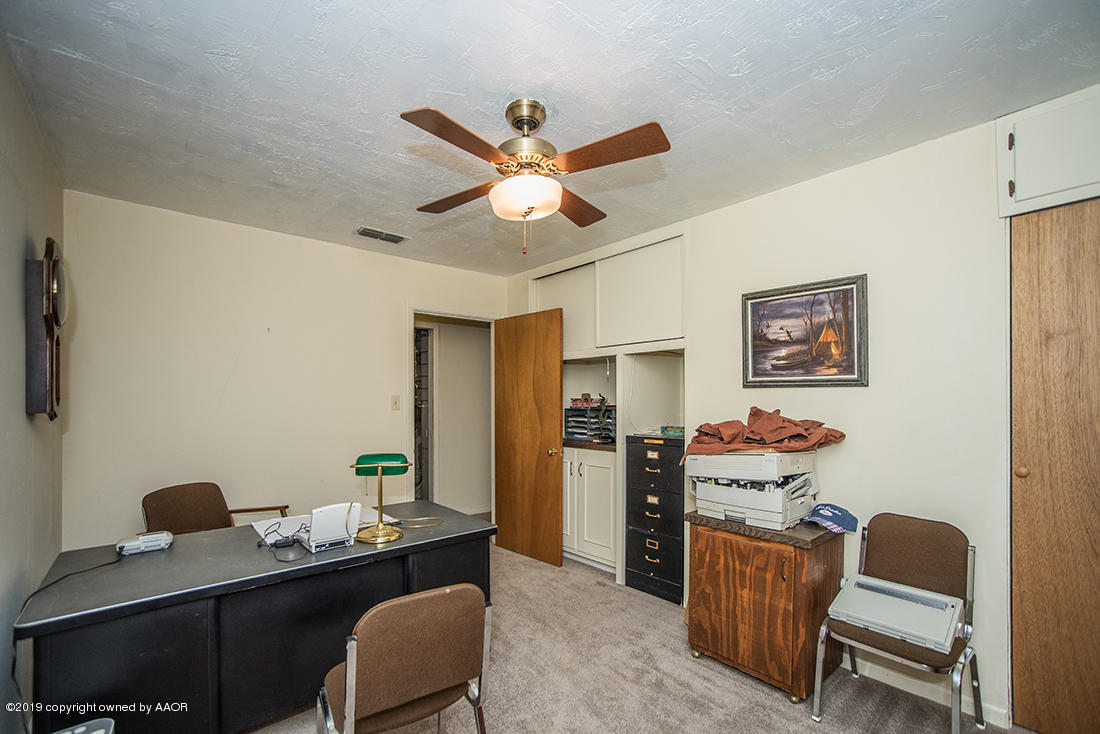 4404 South Hayden Street Amarillo, TX 79110 - Photo 23 of 29 a work room with furniture