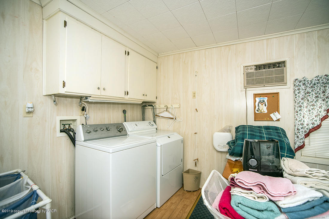 4404 South Hayden Street Amarillo, TX 79110 - Photo 25 of 29 a utility room with dryer and washer