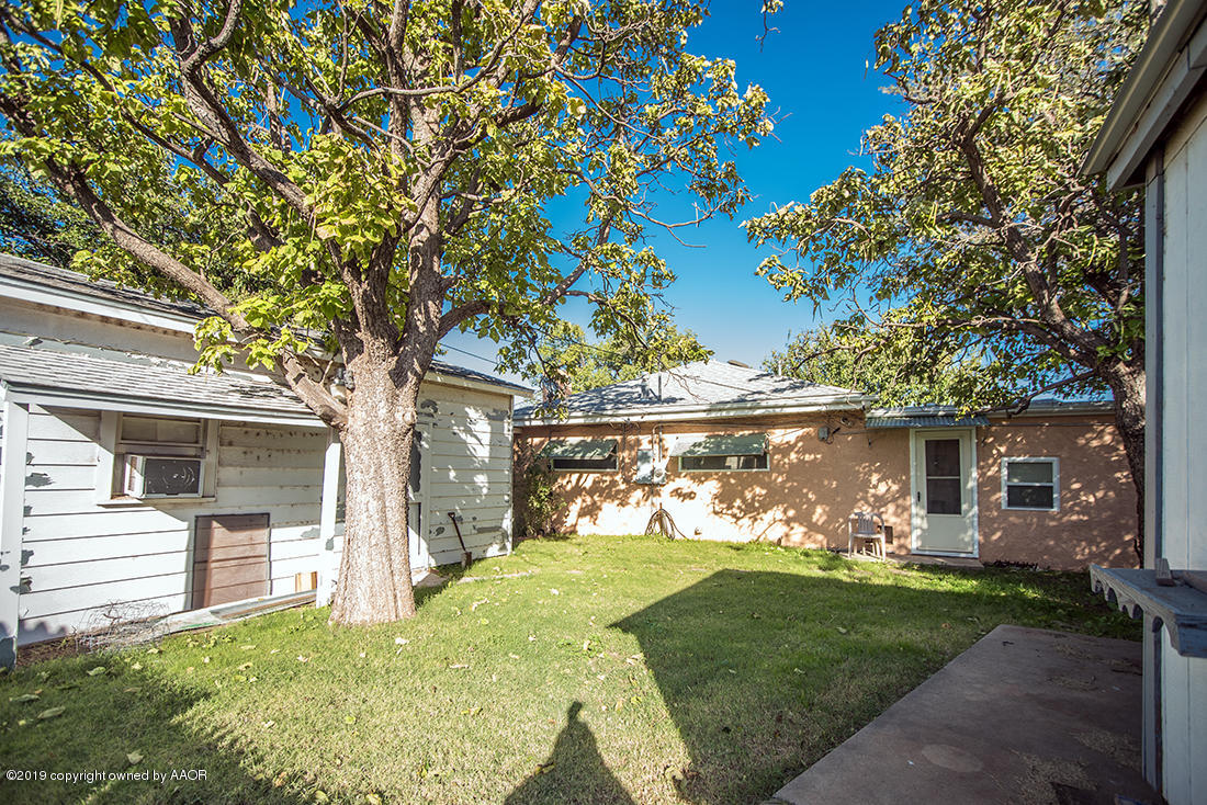 4404 South Hayden Street Amarillo, TX 79110 - Photo 29 of 29 a front view of a house with garden