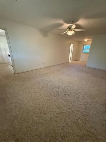 a view of a livingroom with a fan