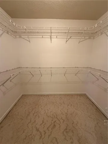 a view of a room with racks on the wall